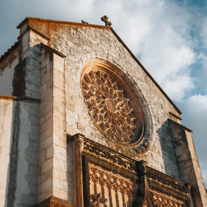 The gothic rose window of Igreja de Santa Maria da Graça in Santarém, Portugal