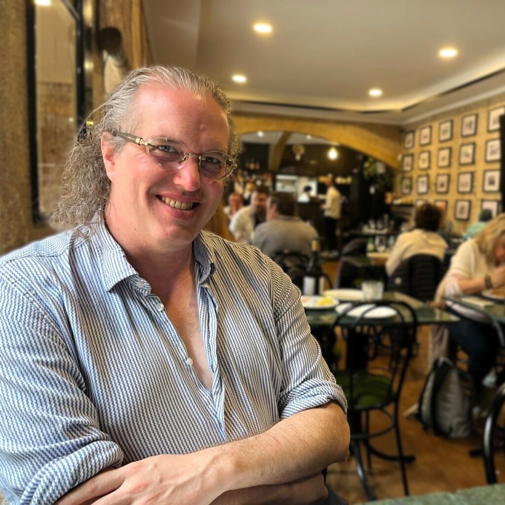 paul-b-sturtevant-cafe Portrait of Paul B. Sturtevant, sitting in a Lisbon cafe.